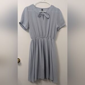 Nadasha Light Blue Dress with Elasticized Waist, Scallop Details, and Bow